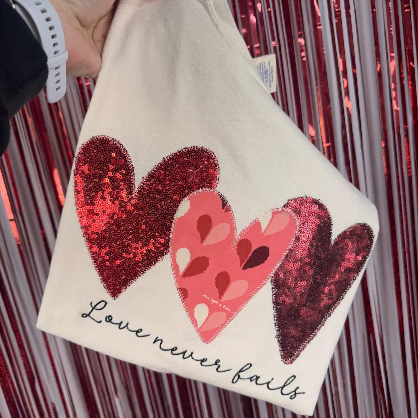 Love Never Fails Tee